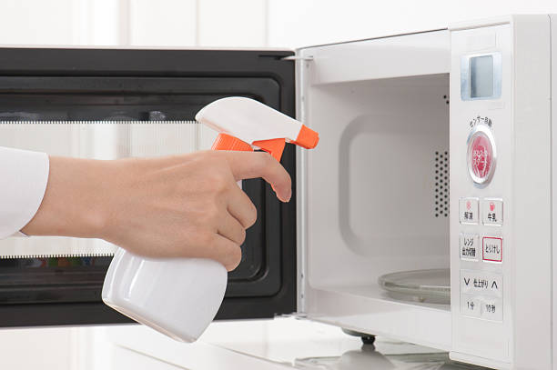 istock Cleaning of the microwave oven 586734654