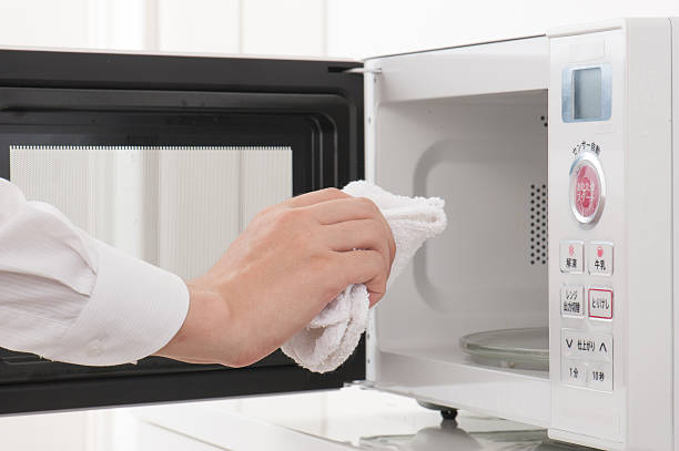 istock Cleaning of the microwave oven 586734728