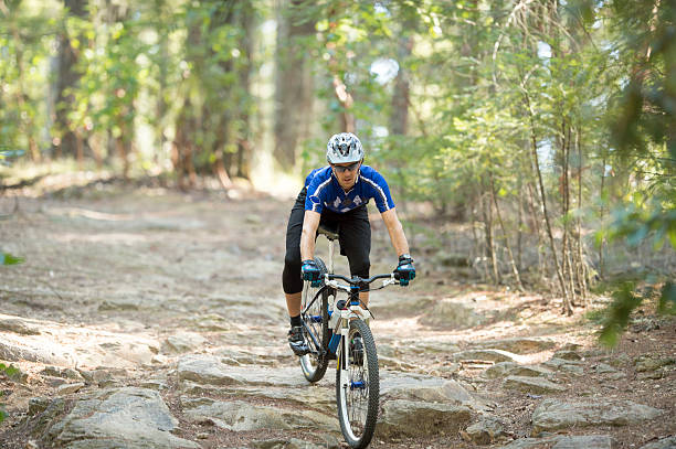 istock A man is doing extreme mountain biking through the 586737910