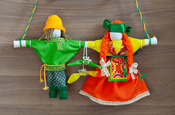 istock Traditional old Russian folk dolls lovebirds. 586740928