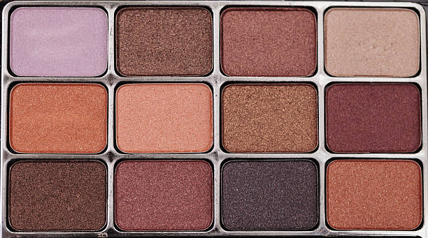 istock Tan, orange, purple, lilac and brown eye shadow 586741194
