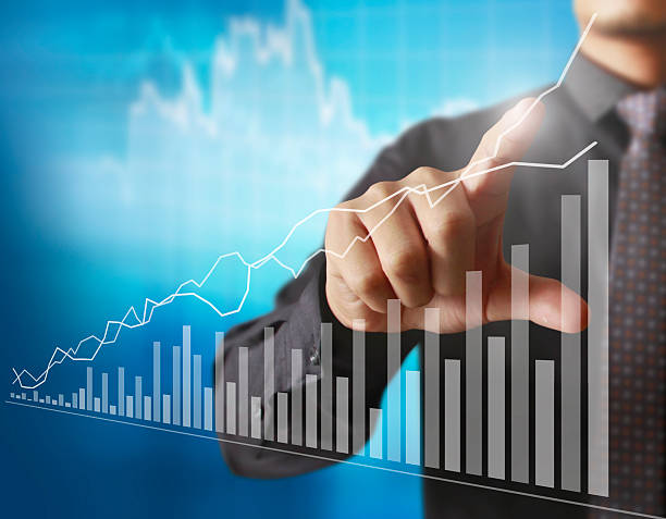 istock financial symbols coming from hand 586742058