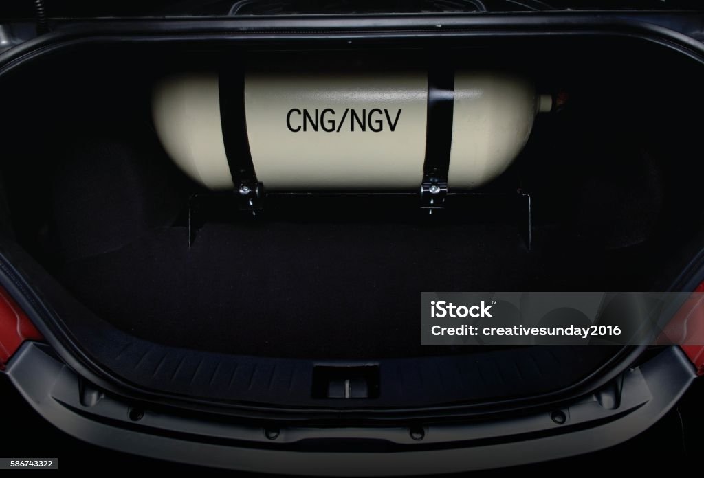 Gas tank CNG/NGV tank inside car trunk. Car Stock Photo