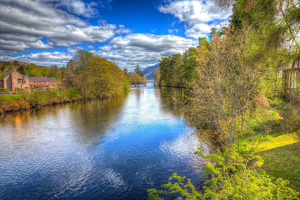 River Oich Fort Augustus Scotland UK Scottish Highlands colourful HDR River Oich Fort Augustus Scotland UK Scottish Highlands popular tourist village next to Loch Ness in colourful HDR fort augustus stock pictures, royalty-free photos & images