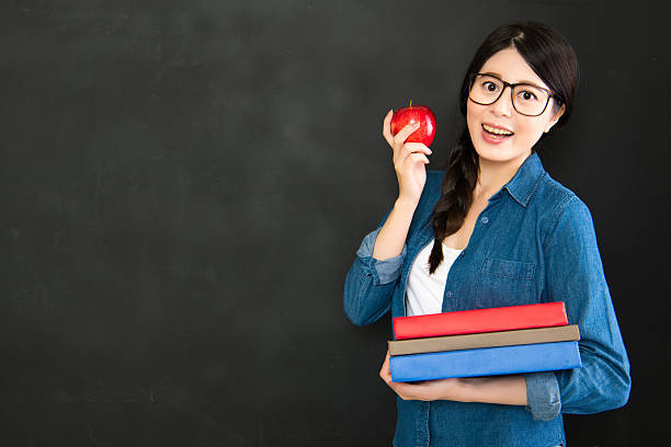 istock university student happy to back to school with smiley face 586748948