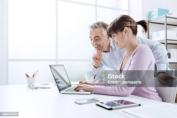 Business People Working At Office Desk Stock Photo - Download Image Now - Adult, Assistance, Assistant