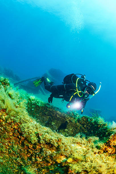 istock Wreck diving over a shipwreck Scuba diver point of view 586917784