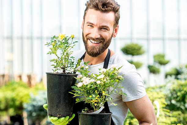 istock Gardener with a flowerpot 586921184