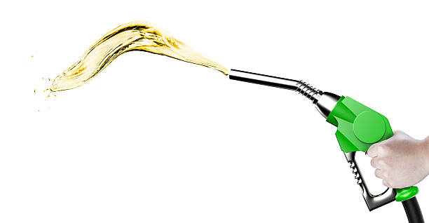 istock green gas pump nozzle with oil drop 586921432