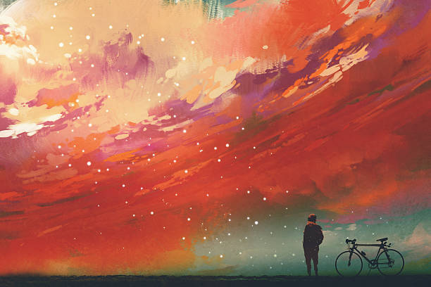 człowiek z rowerem stojącym przed czerwonymi chmurami na niebie - acrylic painting illustrations stock illustrations