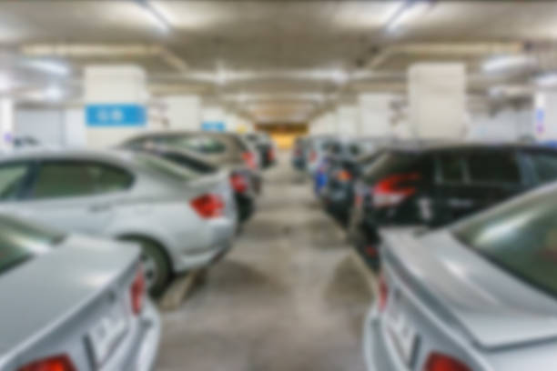 istock Blur parking with cars 586922228