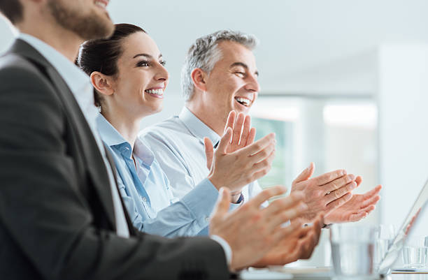 istock Business people clapping hands during a seminar 586925072