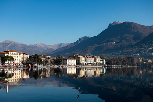 Reflections of the city of Lugano, Switzerland stock photo