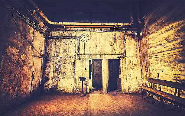 istock Vintage toned grunge interior with clock on a wall. 586925570