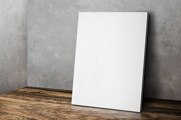 istock Blank white poster frame leaning at grunge grey concrete wall 586926904
