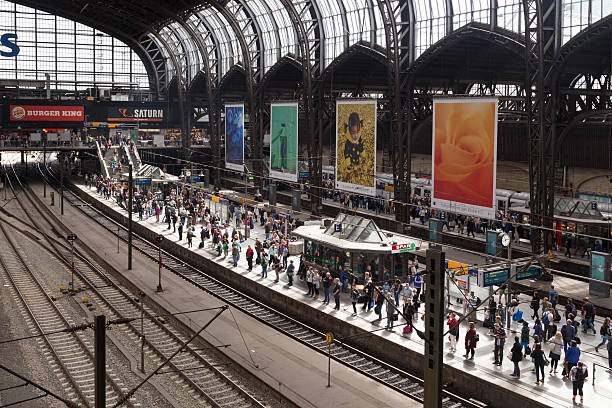 Hamburg, Germany - August 5, 2016: People waiting for their train on the platform at the central station