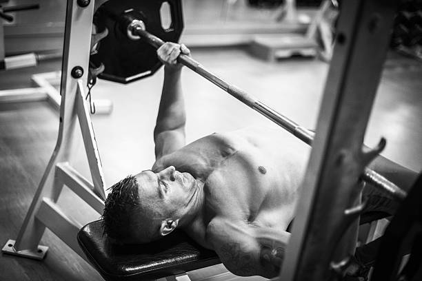 Emtpy bench for weight lifting in a gym.