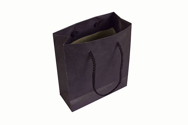 istock black bag isolated on white background 586931870