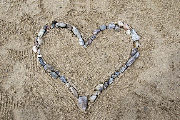 istock Heart of stones on the beach 3 586933092