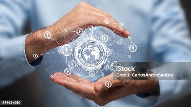 Businessman Holding In Hand A Global Connection Communications Concept Stock Photo - Download Image Now