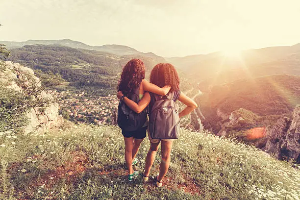 Photo of Friends on the mountain peak