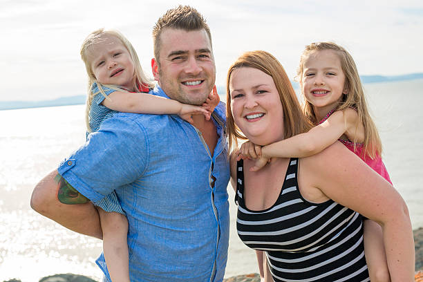 istock Family having great time ocean 586936248