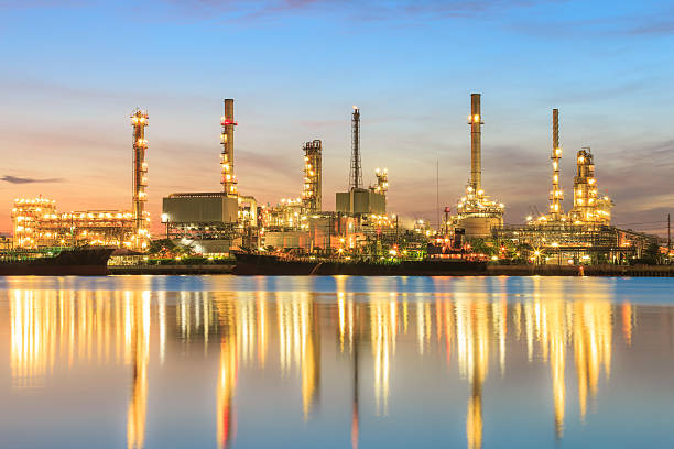 istock Oil refinery plant at dusk. 586936922