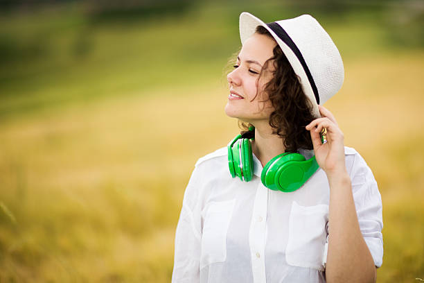 istock Beautiful young women in wheat 586938540