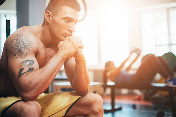 istock Focusing and concetration before daily workout in gym 586944116