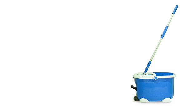 istock Mop and bucket isolated on white 586945276