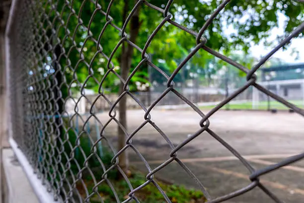 Photo of Close up Metal fence  background. (Selective focus)