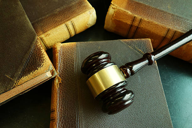 istock Old law books and gavel 586948898