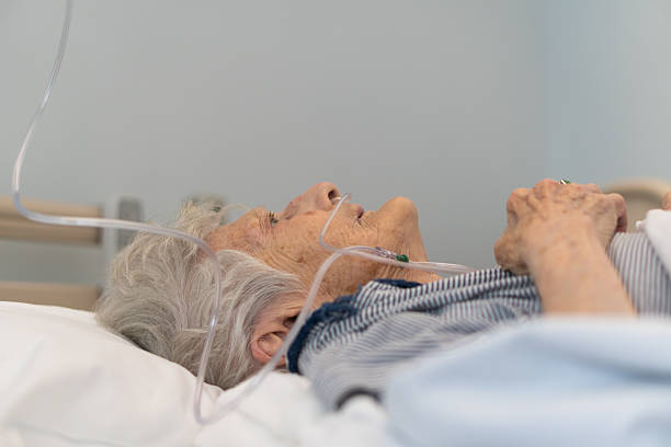 istock Female senior with nasal cannula. Selective focus 587186570