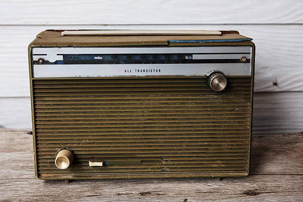 istock Old radio on wooden table 587186788