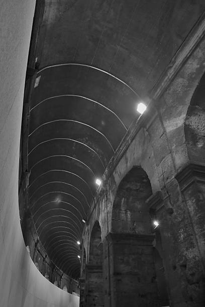 istock Entrance Ways Into Collosseum-Black and White 587187684