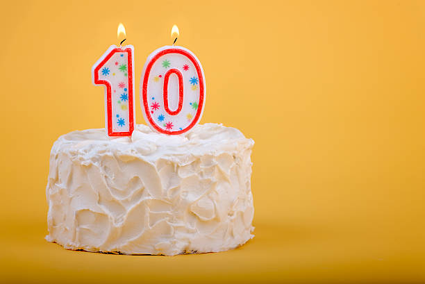 istock Birthday cake with ten on it in candles 587187686