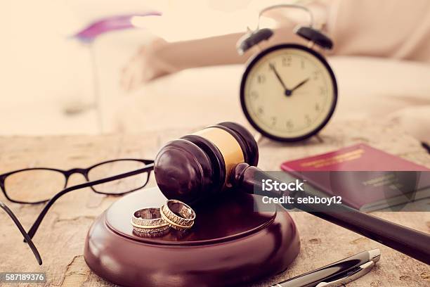 Law Concept Gavel Clock And Money On Wooden Table Stock Photo - Download Image Now
