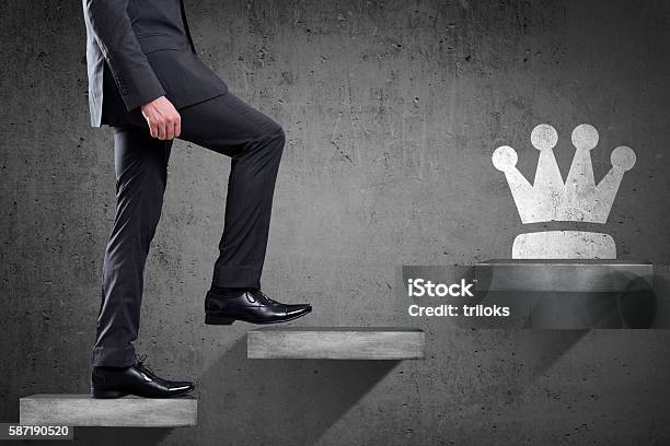 Businessman Is Climbing Up To Get Crown Stock Photo - Download Image Now - Business Person, Development, Dirty