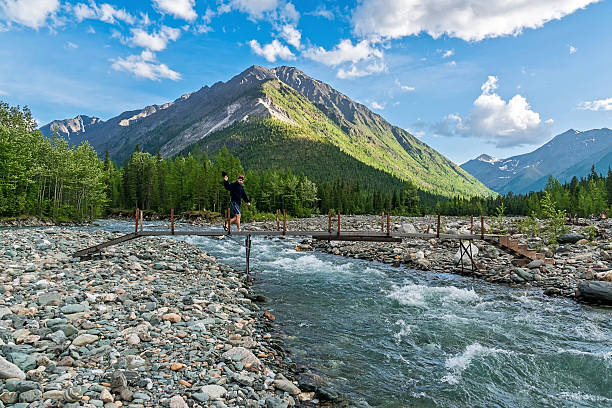 istock bridge over the river Shumak in tunka range 587190536