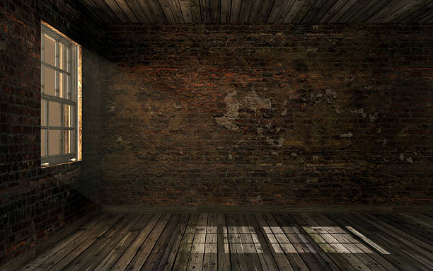 Empty dark abandoned room with volume light through window pane stock photo