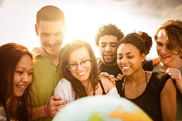 istock teenagers college student smiling with globe 587191722