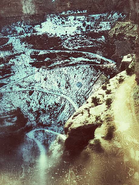 istock Snow Covered Zig Zag Switchback Mountain Canyon Road Abstract 587194272