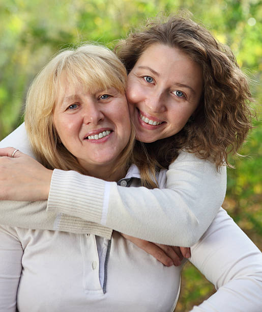 istock Middle age woman with her daughter 587194328