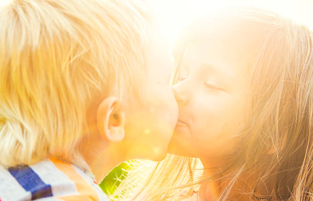 istock Shildren kissing 587194408