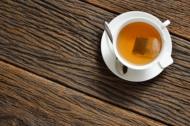 紅茶  - cup tea teabag tea cup ストックフォトと画像