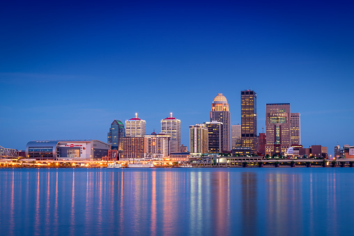 looking across the river just after sunset at the Louisville, Kentucky skyline.