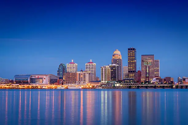 looking across the river just after sunset at the Louisville, Kentucky skyline.