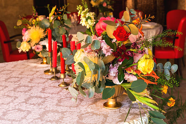 istock Decorated table, vases of flowers. Close up. Wedding concept 587195586