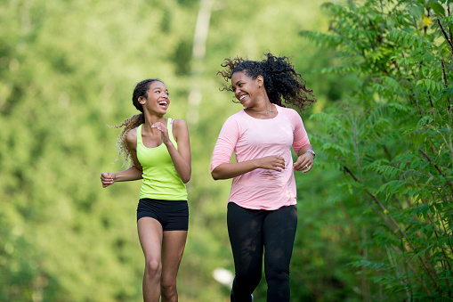 A mother and her daughter are going on a run together on mother's day.