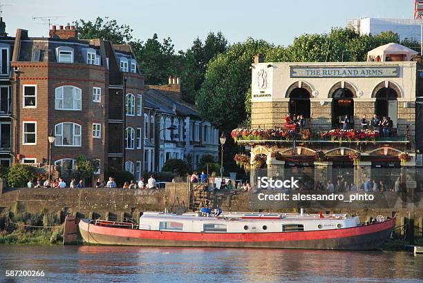 The Boat And The Pubs Stock Photo - Download Image Now - Bar - Drink Establishment, City, Commercial Dock